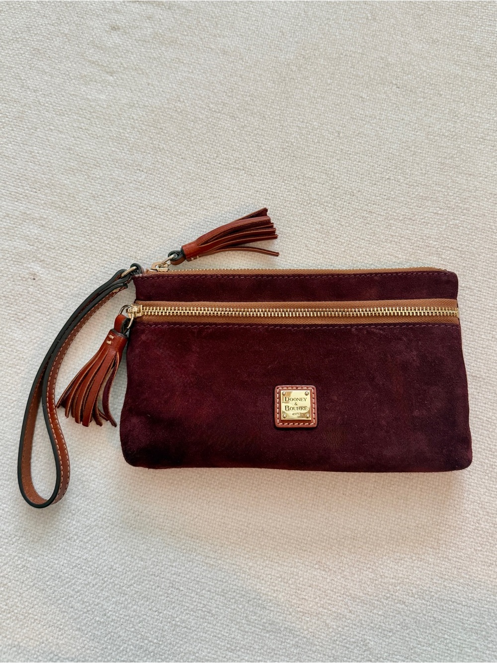 Dooney & Bourke Wine Suede Wristlet with Leather Tassels